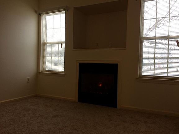 freshly painted living room with new carpeting