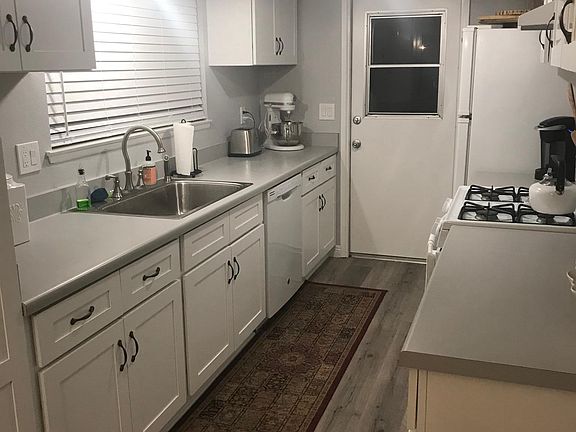 Farmhouse sink with all new cabinets