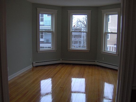 Living room prior to current tenants - beautiful hardwood floors