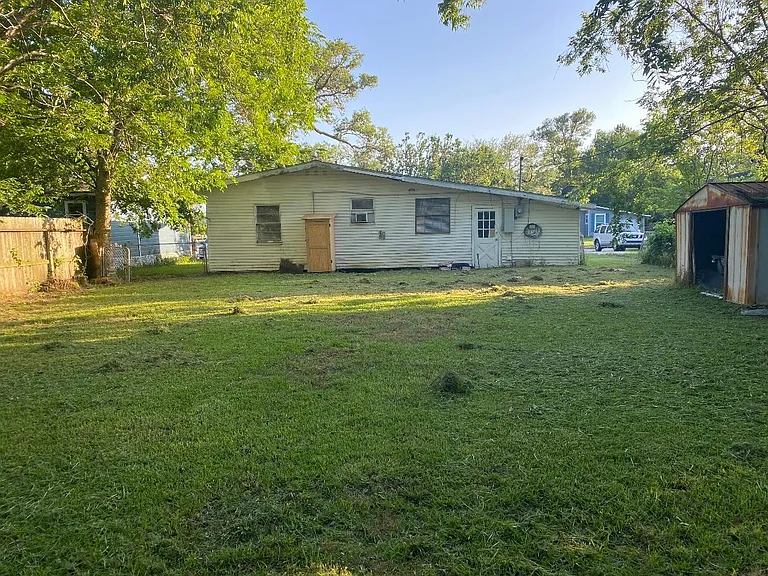 Back view of the house and the yard