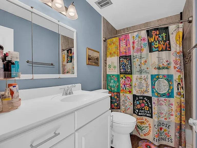 Full bath with custom tile bathtub surround and storage behind mirror.
*Space is not furnished. Pics are for design inspiration only.