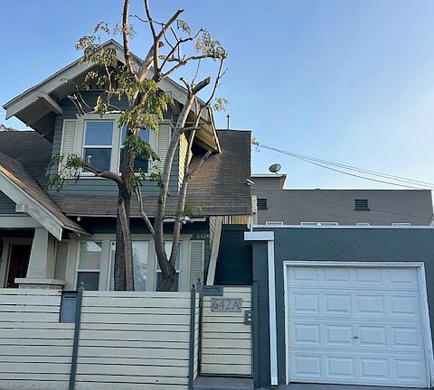Front gate entrance + closed garage