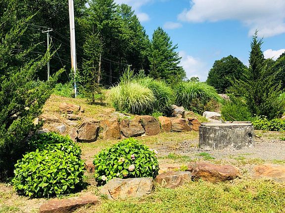 Gardens privacy berm around property