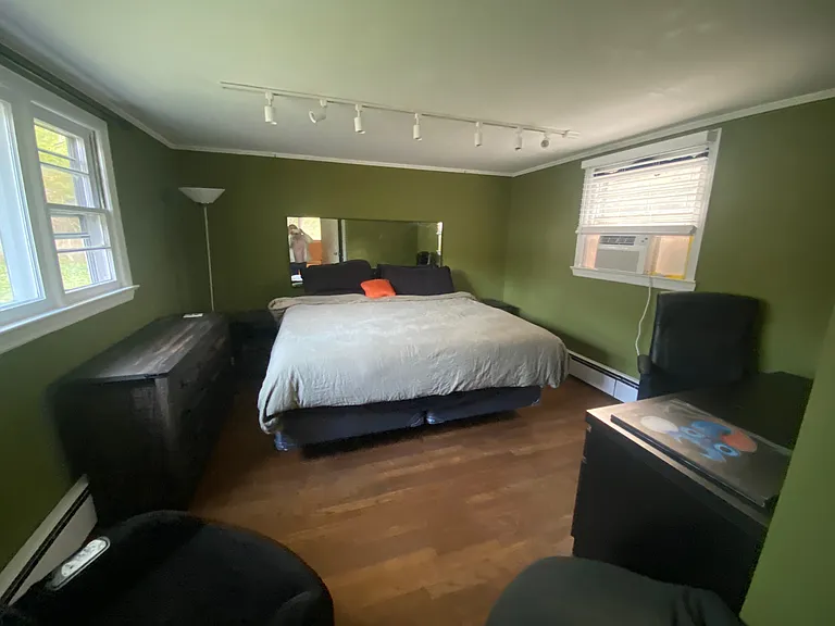 master bedroom with 2 closets, real wood oak floors
