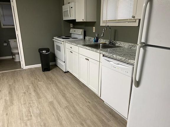 Eat-in kitchen with new dishwasher