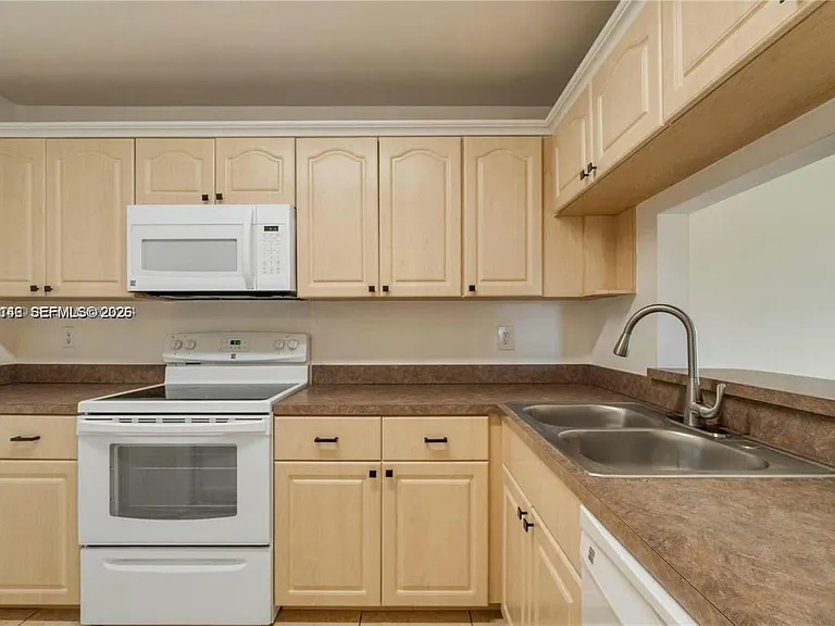 561 NW 100th Pl #201 — Photo 17