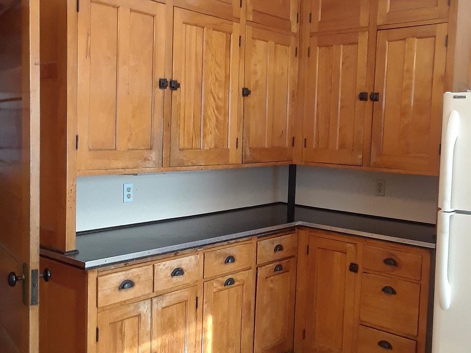 Kitchen with original maple cabinets