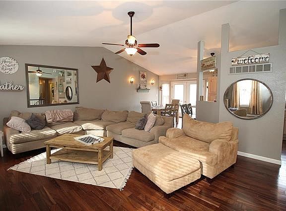 What can I say except GORGEOUS!  Look at those hardwood floors and vaulted ceilings...