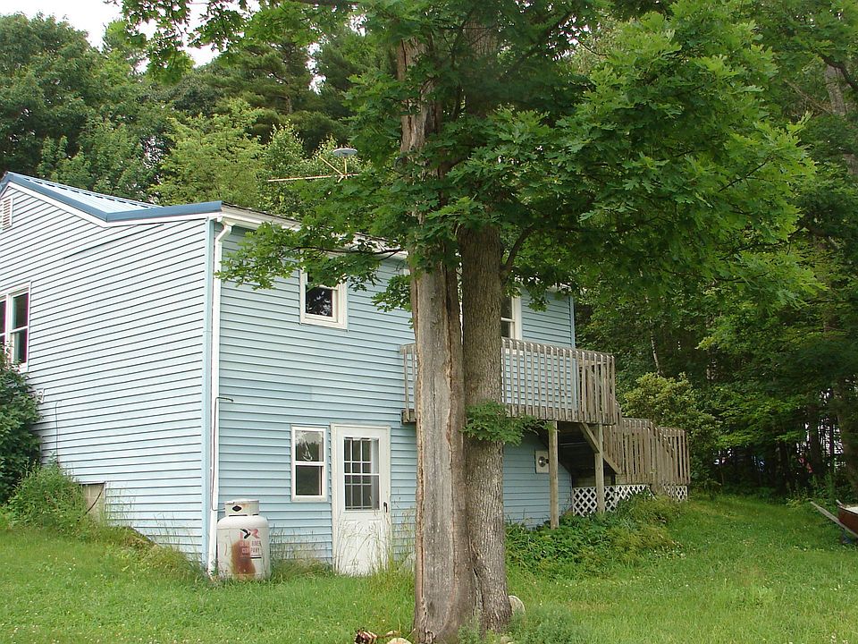 The backside of the house, facing the water.  Finished daylight, walkout bsmnt