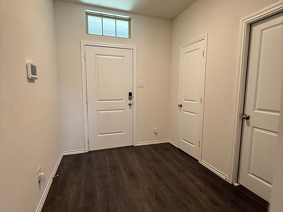 entrance door, side closet next to garage door