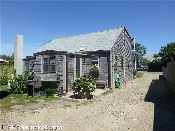 This cottage is situated behind the main house with room for expansion.