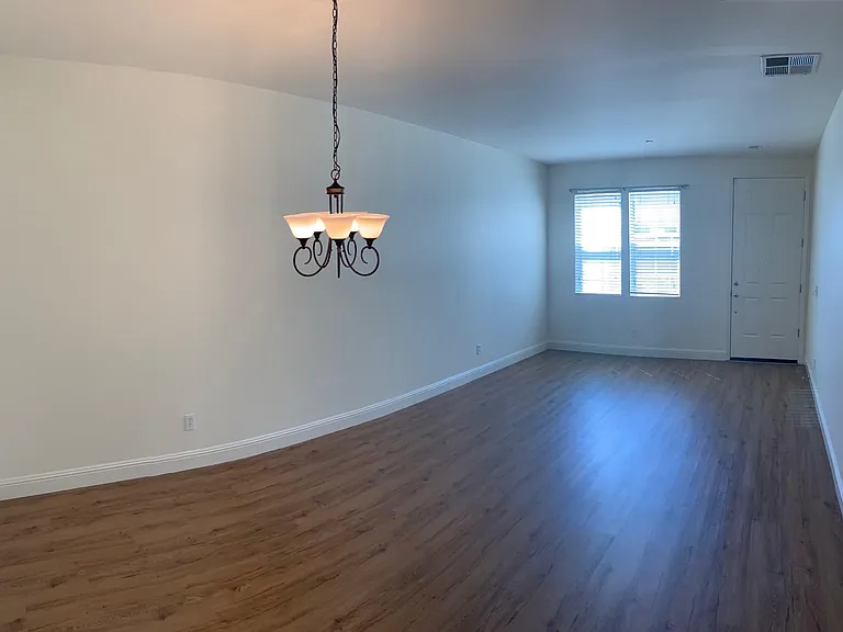 Living room. Luxury Vinyl Planking throughout.