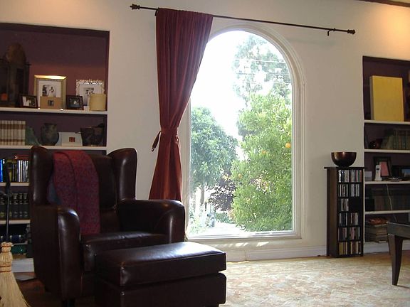 Large Family room with beautiful bay window and fireplace to relax and enjoy life!