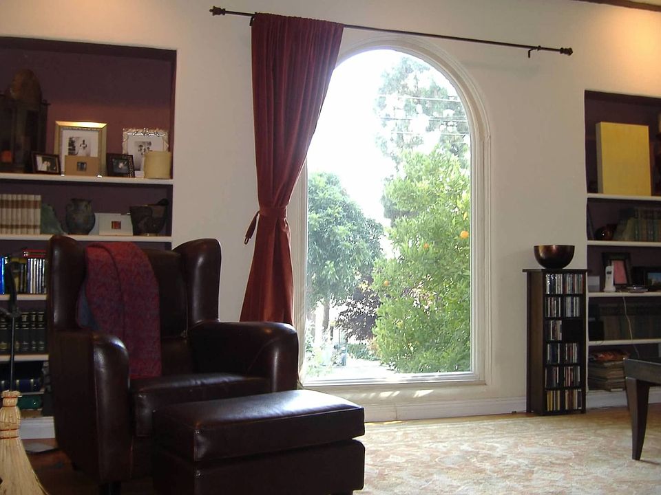 Large Family room with beautiful bay window and fireplace to relax and enjoy life!