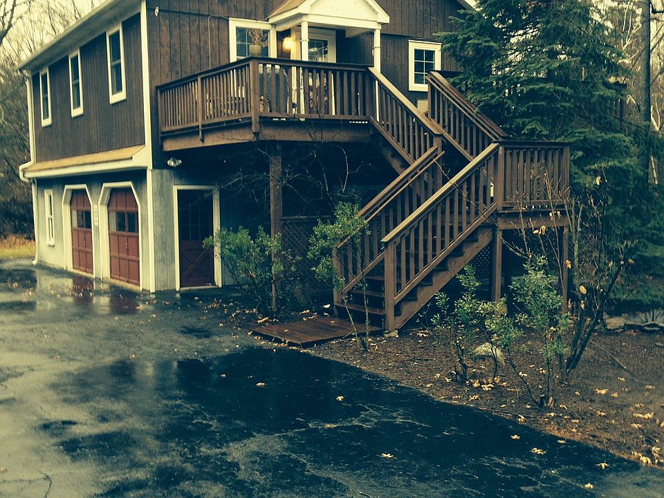 Walk up apartment with gazebo and one car garage