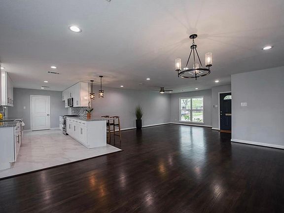 open dining, living room and kitchen