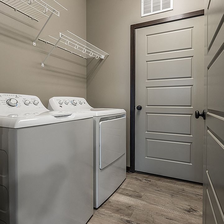 Large full-sized washer and dryer available in select apartments.