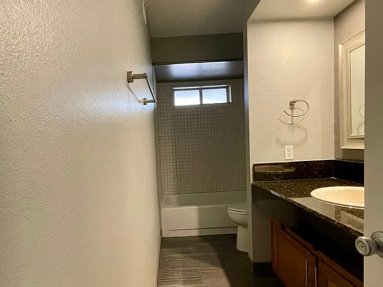 Guest Restroom with granite counter top.