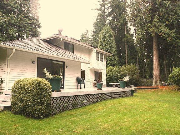 A good-sized lawn area adjacent to the mammoth deck