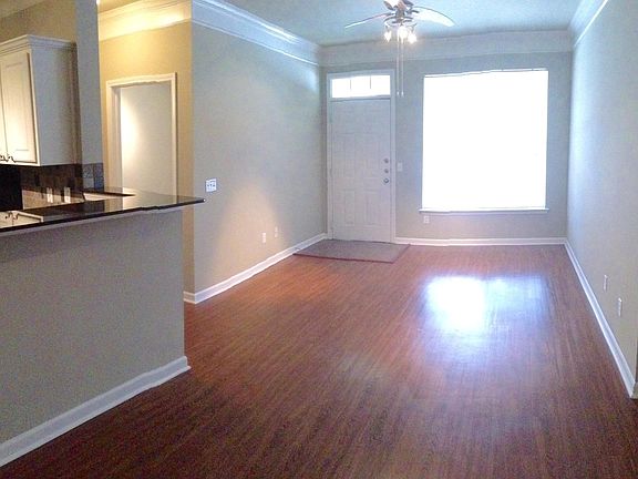 Living room view. The living room has big double payne windo