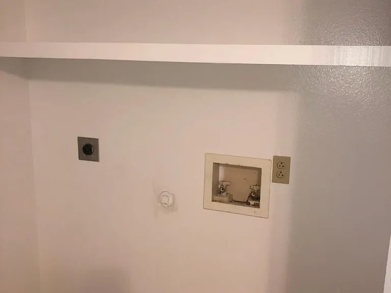 6ft. Wash/Dryer closet. Both it and the pantry closet are the same size and have great lighting.