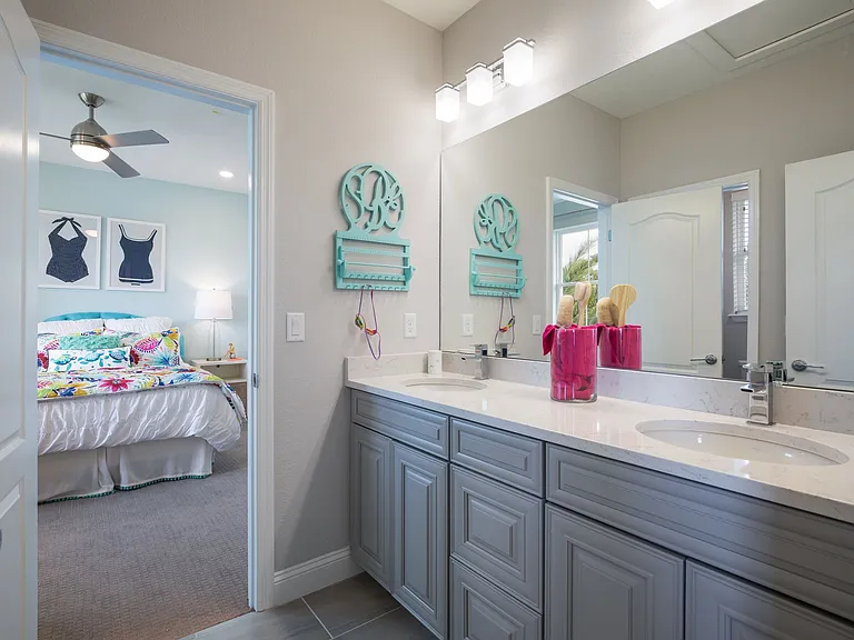 model home pic of the jack and jill restroom common access for both bedroom1 and bedroom2