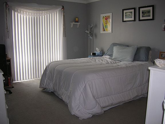 bedroom with patio