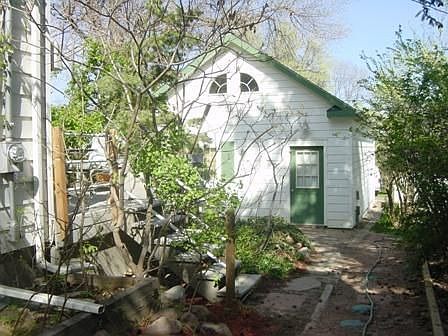South side of house, garage behind