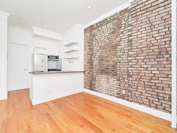 5th image of 104 E 7th St APT 3