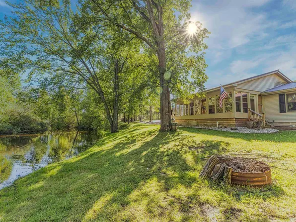 89 River Dr, Merritt, MI 49667