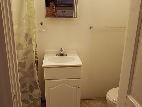 First floor bathroom off kitchen. Has shower