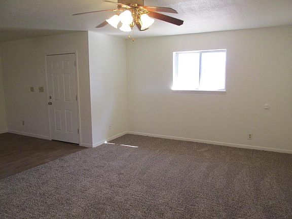 LIVING ROOM LOOKING AT FRONT DOOR