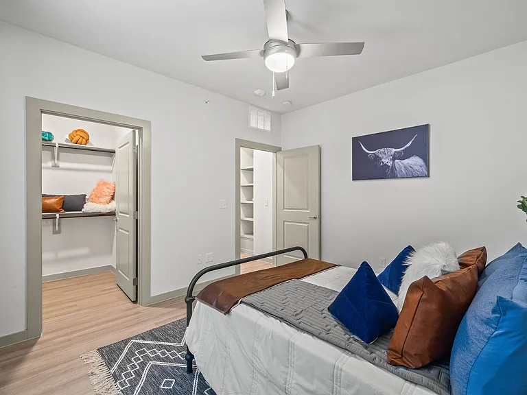 Bedroom and Closet with Hardwood Floors