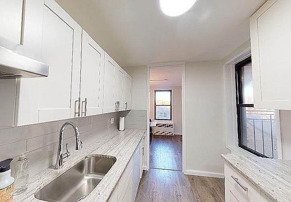4th image of 35-20 Leverich St #703