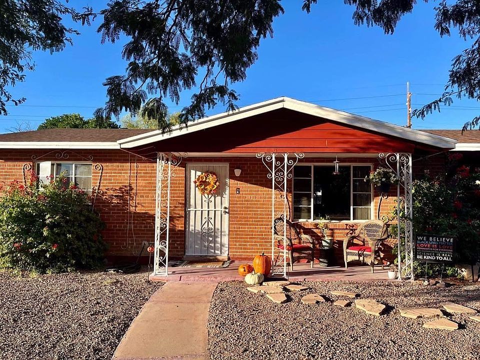 Beautiful Front with covered porch and large windows.