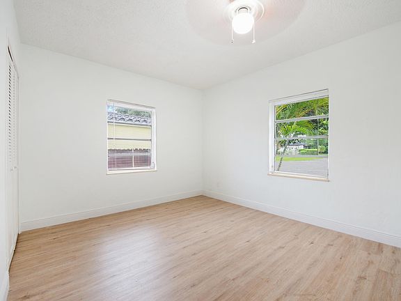 bedroom with two closets