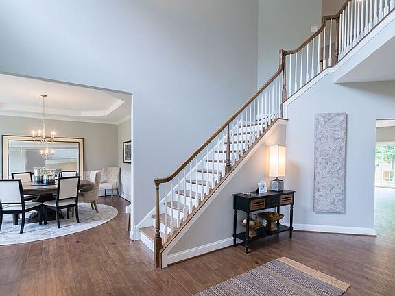 Front hallway with stairs leading up 410 Oxford Drive from hallmark homes
