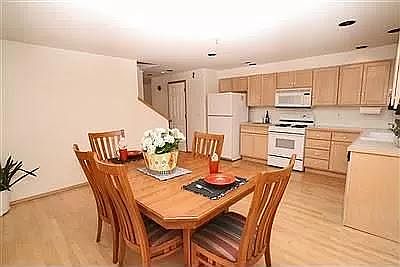 Large kitchen area with dining space.