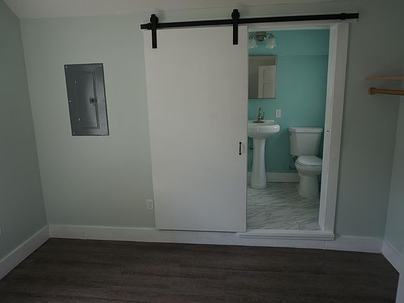 Sliding barn door into bathroom