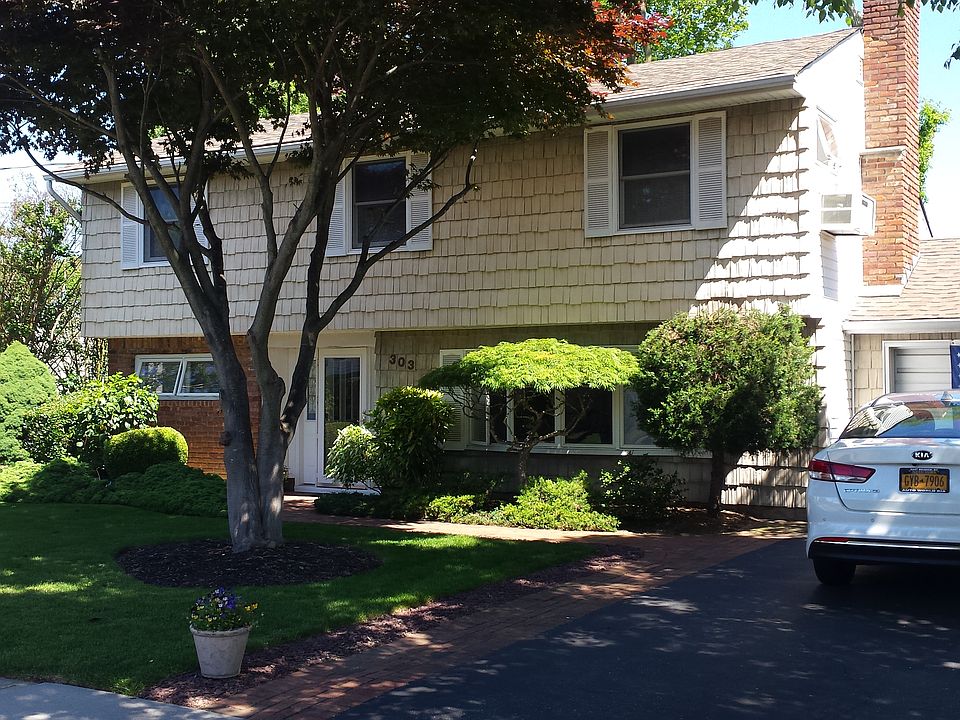 1st image of 303 N Utica Ave