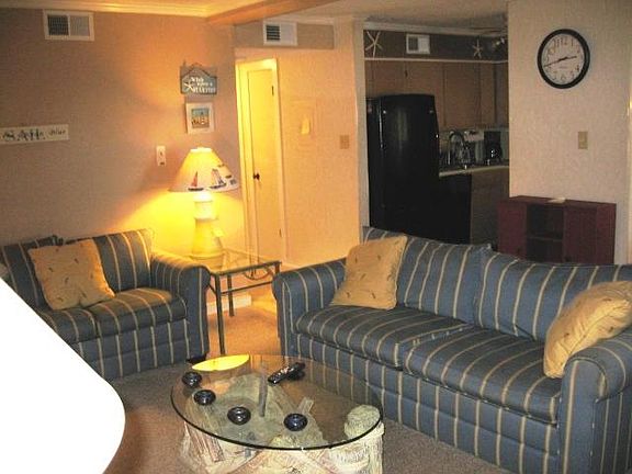 Showing open floor plan to kitchen and dining room