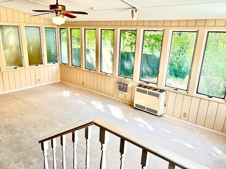 Getting to sunroom from the living room.
spectacular backyard views. Your place for large gathering, or doing Yoga, meditation or just sitting and enjoy your kids play in the backyard.