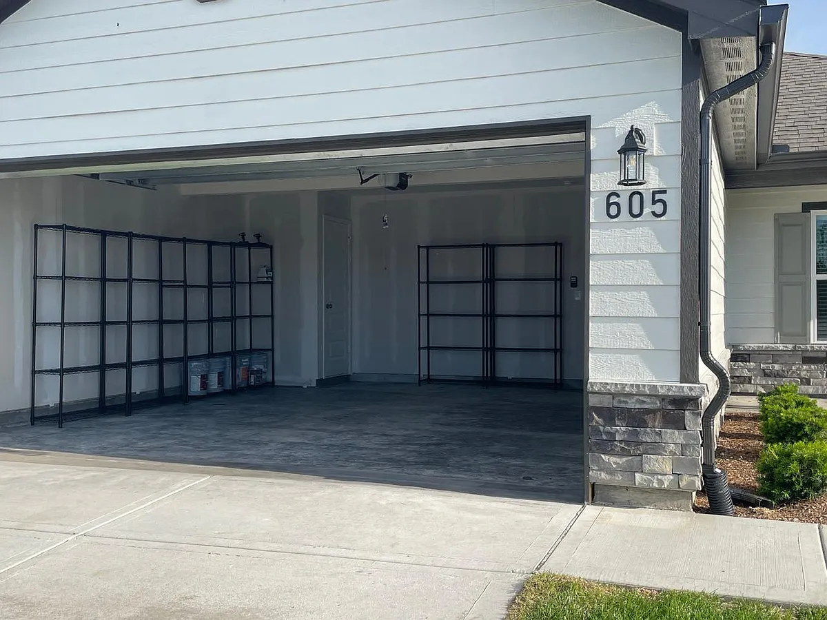 Free standing storage shelving, new. - 605 W Fountain St