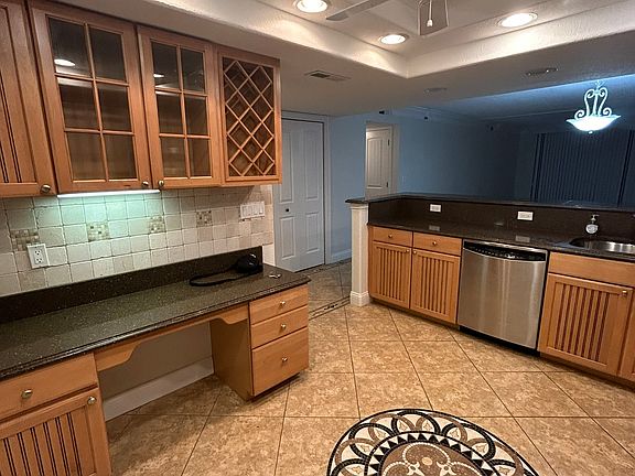 Custom Cabinets - Multi-Purpose Desk Area and Upper Wine Cabinets