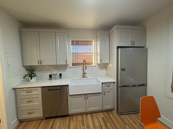 Brand New Kitchen, GE Profile Dishwasher, Disposal, Farm House Sink, High End Cabinets with Quartz solid surface counter tops. Fridge with Ice Maker