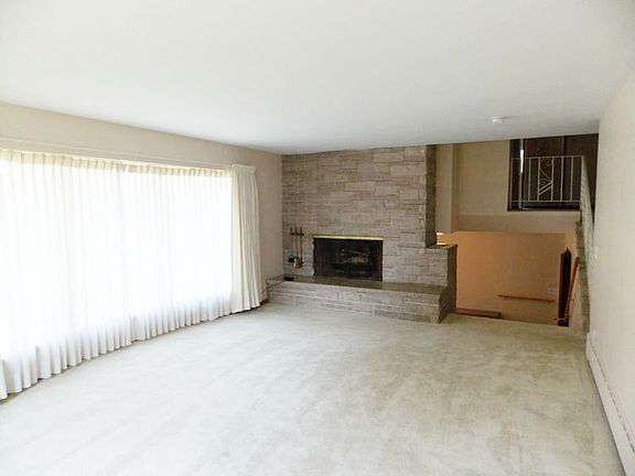 The fireplace is a great accent for the living room.