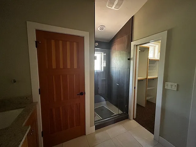 Master Bathroom - shower and closet