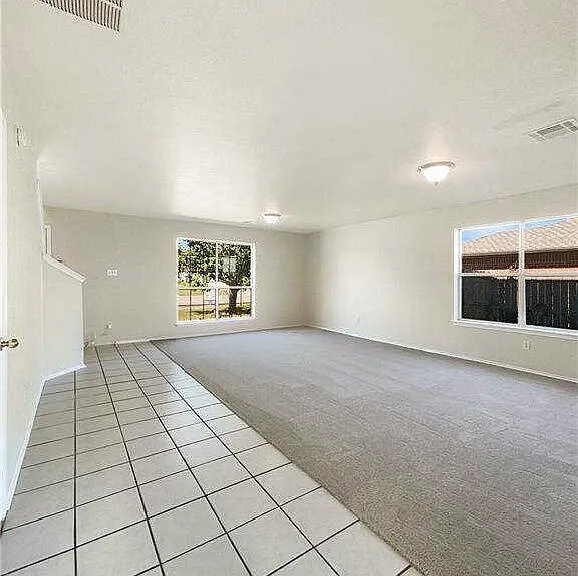 Large area can be divided into formal living & dining rooms
