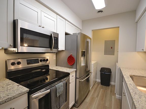 Kitchen with premium stainless appliances and granite countertops