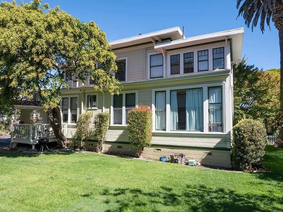 Back of house, with separate entrance and private porch on the left
